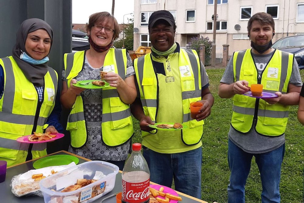 Volunteers on a break eating lunch