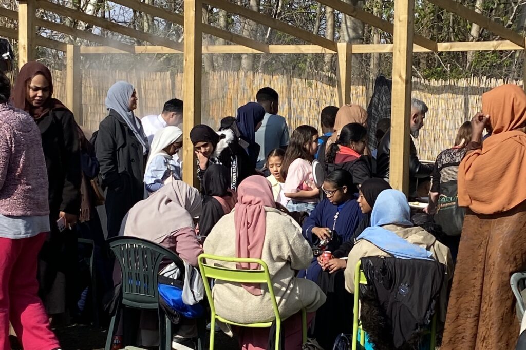 people gathering for Eid meal 2026