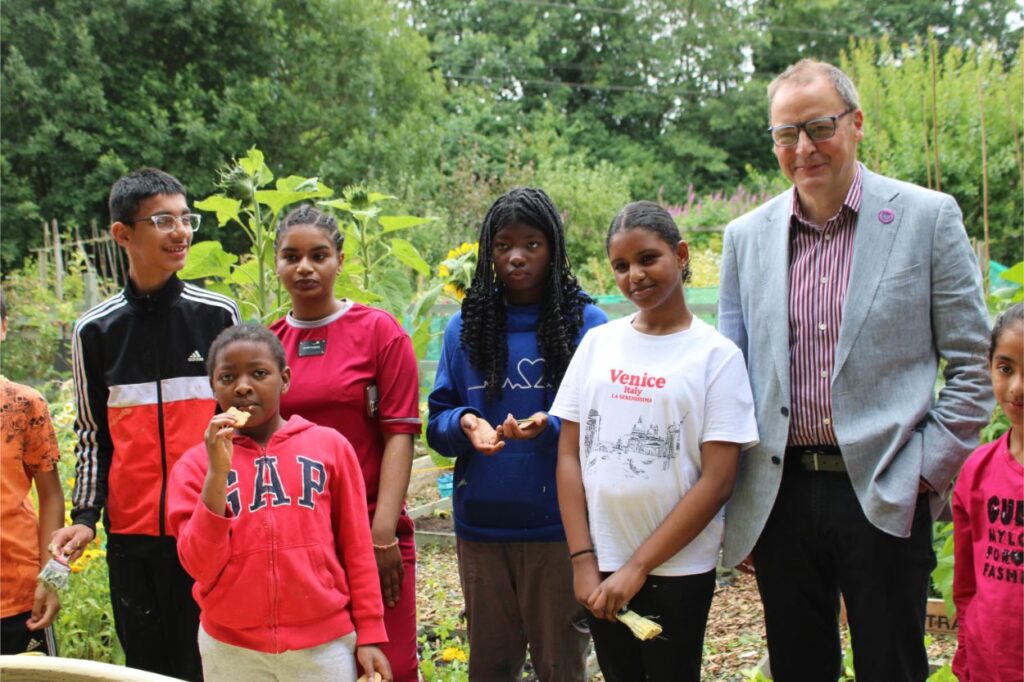 community allotment volunteers with MP